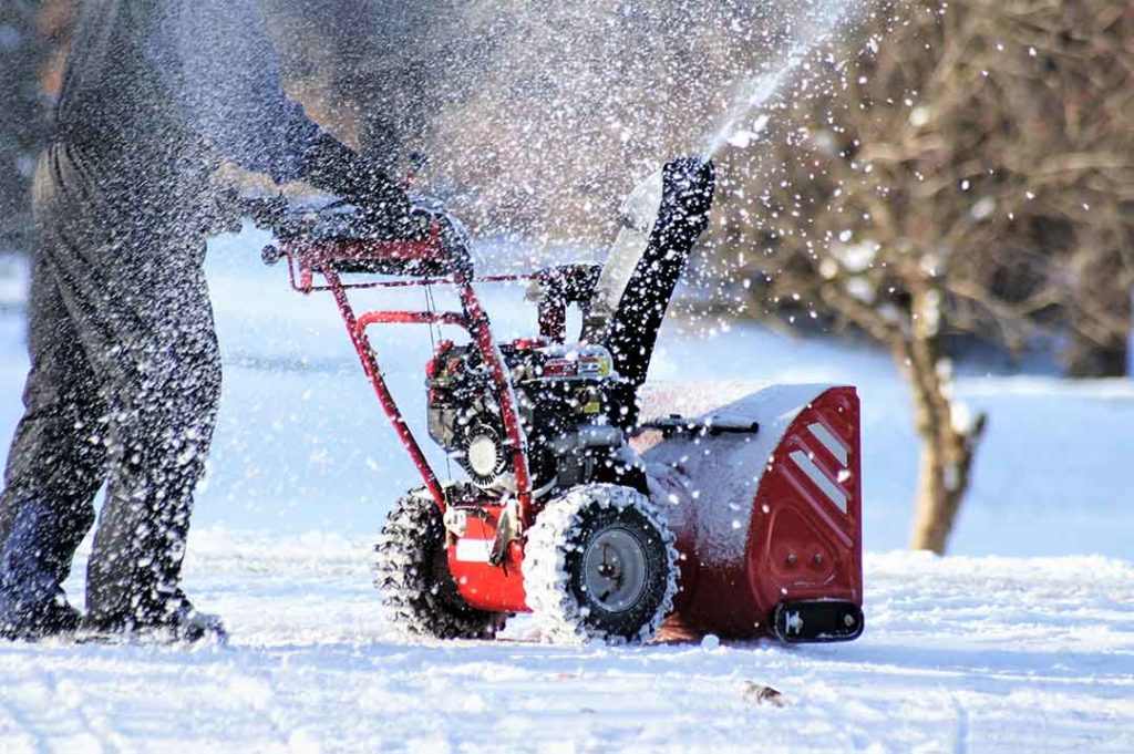 snow spray coming from snow blower